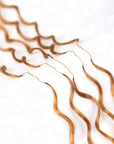 strands of water wave honey blonde crochet braids with invisible knots