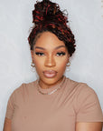 top bun hairstyle influencer used water wave three color crochet hair extensions