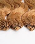 fine ends of body wave textured honey blonde crochet braiding hair