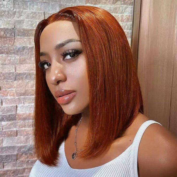 vibrant orange short bob wigs, sleek and edgy human hair bob for dark-skinned queens