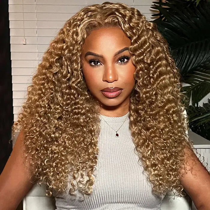 qvr wigs in #27 blonde for a sun-kissed, curly look.
