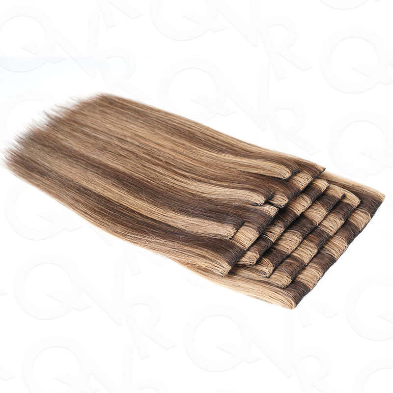 natural-looking clip in extensions with warm brown and blonde tones