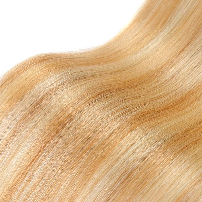 Blonde straight clip in human hair extensions in 