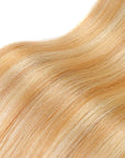 Blonde straight clip in human hair extensions in 