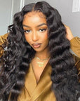 restyled look of natural black loose deep wave human hair bundles with remy hair weave with 4x4 lace closure
