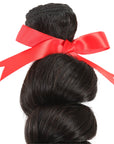 machine weft natural black loose wave human hair bundles 